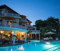 Facing onto the white sands of award-winning Diani Beach, AfroChic is an exotic getaway. The boutique hotel lives up to its name by being both African and chic.

The 10 en-suite rooms are made up of ocean view, garden view, junior suite and executive suite. All