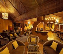 Amboseli Sopa Lodge sits in 190 acres of wooded land at the foot of Mt Kilimanjaro. The lodge is designed to reflect the style of the Maasai: its reception replicates the entrance to a Maasai hut and its ornaments are silver spear heads, beaded necklaces and