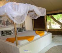 Bare feet are recommended at this rustic idyll on the beach. About half an hour north of Malindi, this camp is beachfront, secluded and welcoming.

The 6 tented rooms all have permanent bathrooms and thatched makuti roofs. The handcrafted furniture includes 4-poster beds, daybeds and arm