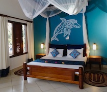This collection of cottages is centrally located in Diani, near restaurants, bars and shopping centres, and a short walk from award winning Diani Beach. 

There are 6 en-suite cottages, made up of 2 2-bedroom cottages and 4 1-bedroom cottages. Each cottage has a fan, mosquito net, and a