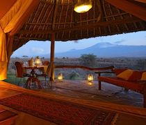 From a grove of the acacia tortilis trees that gave the camp its name, Tortilis Camp looks across the plains at Mt Kilimanjaro. Set in a 20,000-acre private concession bordering Amboseli National Park, Tortilis has a reputation for charm and attention to detail.

There are 17