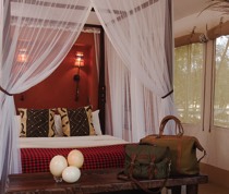 Framed by a curve of the Mara River, the Fairmont Mara Safari Club is a tented sanctuary on the edge of the Maasai Mara National Reserve. The club opened in 1989 on the site of an old hunting camp that had been converted to photo safari