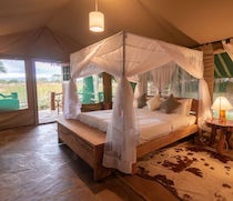 Named after the highest peak of Mt Kilimanjaro, Kibo Safari Camp is an authentic tented safari camp with striking views of the mountain.

There are 71 en-suite tents, shaded by thatched roofs. They are furnished with rustic furniture including solid wood bed, mosquito net, clothes rack,