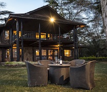 At the foot of Mt Kilimanjaro, Kibo Villa is an elegant log cabin built in stone and gum tree. The villa is sheltered by a copse of indigenous acacia tortilis trees in 5 acres of garden, and offers both peace and privacy.

There are 3 en-suite bedrooms,