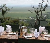 True to its name, Swahili for mountain, Kilima Camp sits high on the Oloololo Escarpment and has a sweeping view of the plains of the Maasai Mara National Reserve and the Mara River. The camp opened in 2007 and offers an authentic camp experience.

The 12 en-suite