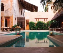 In charming Swahili architecture, Lamu House is an elegant fusion of traditional style and modern facilities. The house faces directly onto Lamu seafront, and is made up of 2 restored houses surrounding a central courtyard with swimming pool.

There are 10 en-suite rooms, made up of 4 singles