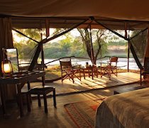 Named after Erik Ole Larsen, a Dane credited with enhancing the style of luxury tented camps, Larsen’s Camp is a camp that would have made him proud. On the banks of the Ewaso Nyiro River, the camp looks out across the pristine wilderness of