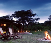Leleshwa Camp is an intimate tented camp situated on the Siana Conservancy on the northeastern edge of the Maasai Mara National Reserve. Resting along a stream, overlooking picturesque hills and rolling plains dotted with resident game, Leleshwa Camp is a peaceful haven. The 6 en-suite tents