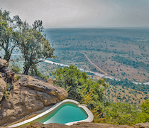 High on the Siria Escarpment, Mara Siria is a traditional safari camp with wonderful views over the Maasai Mara National Reserve.

The 14 en-suite tents and cottages comprise 8 luxury tents, 2 deluxe tents, 2 Maasai style cottages, and 2 twin tents. The luxury tents and twin tents are fully