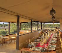 On the banks of the Ewaso Nyiro River in Ol Pejeta Conservancy, Ol Pejeta Bush Camp is an atmospheric traditional safari camp. The camp is owned and managed by Alex Hunter.

The 7 en-suite tents all have comfortable locally crafted furniture, rechargeable solar lights, safari showers