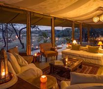 Established in 2006 as Richard and Liz Roberts’ family home, this lovely camp is in the Mara North Conservancy, bordering the Maasai Mara National Reserve. The camp is on the banks of the Njageteck River and has clear views of the animals drawn to the river