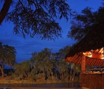 One of Kenya’s original game lodges, Samburu Game Lodge was established in 1962. This traditional safari lodge is strung out along the banks of the Ewaso Nyiro River.

The 61 en-suite rooms are made up of standard rooms, river rooms, junior suites and cottages. The standard